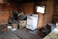 An abondoned trappers cabin in a state of disrepair