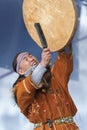 Aboriginal dancer in traditional clothes of native people dancing with tambourine. Concert Koryak Dance Ensemble Mengo