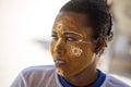 The Aboriginal girls decorate their faces, Amoronia orange coast, Madagascar