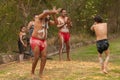 3 Aboriginal men dance in circle on grass in Newcastle, Australia