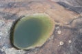 Aboriginal water gathering pool in australia rockart Royalty Free Stock Photo