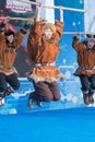 Aborigine female dancer jumping in national clothes of indigenous people Kamchatka Peninsula. Koryak National Dance