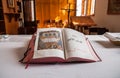 Christian Bible in Arabic language on the altar of Christian church in Aboud Village