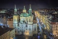 Above baroque church of Saint Nicholas in Prague old town square at night Royalty Free Stock Photo