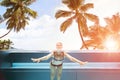 Above Below Water Photo Of Woman In Pool