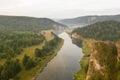 Bird`s eye view of Agidel river with morning haze