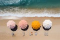 From above, a captivating beach with umbrellas, sunbeds, and turquoise waters Royalty Free Stock Photo