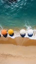 From above, a captivating beach with umbrellas, sunbeds, and turquoise waters Royalty Free Stock Photo