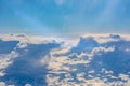 Above Clouds Airplane Window Blue Daytime Fluffy Column Wispy White Puffy Royalty Free Stock Photo