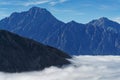 Above the clouds, a cloud inversion, in the hooker Valley, Aoraki / Mount Cook National Park, south island, Aotearoa / New Zealand Royalty Free Stock Photo