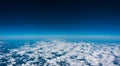 Above the clouds. Holiday flight, view out the air plane window. Royalty Free Stock Photo