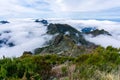 Above the clouds on the mountain peak Pico Ruivo towards the opposite peak Achada do Teixeira on Madeira Island - Cloud