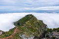 Above the clouds on the mountain peak Pico Ruivo towards the opposite peak Achada do Teixeira on Madeira Island - Cloud