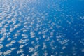 Above clouds - clouds over ocean aerial Royalty Free Stock Photo