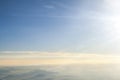 Above the clouds with the sun and mountains. Royalty Free Stock Photo