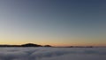 Above the clouds after losing it all, glimmer of hope Royalty Free Stock Photo