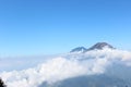 Above the clouds, the top of the mountain Royalty Free Stock Photo