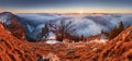 Above clouds in winter - mountain landcape at sunset, Slovakia