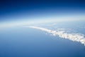 Above the earth at the clouds below Royalty Free Stock Photo