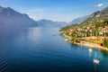 Above idyllic Lake Garda with sailboats in Malcesine at sunrise, Italian alps Royalty Free Stock Photo