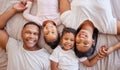 Above, relax and portrait of a family on a bed for love, comfort and fun in the morning. Together, smile and parents Royalty Free Stock Photo