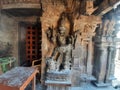 1000 year old sculpture of Dwarapalaka, inside the Subrahmanya temple in  Brihadeeswara Temple Thanjavur Tamilnadu India Royalty Free Stock Photo