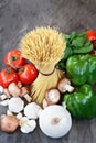 Above Shot of Raw Spaghetti and Ingredients for Sauce