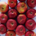 From above shot of tasty red apples flat lay. Gyration red ripe apples close-up. Royalty Free Stock Photo