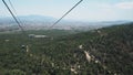 Above the trees - Cable car - Mount Parnitha: Athens, Greece Royalty Free Stock Photo