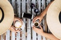 Above vetical view of couple of caucasian people women friends together taking italian coffee and cappuccino at the bar - concept