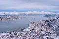 Above view of beautiful winter landscape of snow covered town Tromso Royalty Free Stock Photo