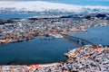 Above view of beautiful winter landscape of snow covered town Tromso Royalty Free Stock Photo