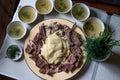 Beshbarmak - traditional kazakh and tatar dish made of bolied beef meat, bouillon, and dough