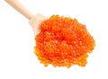 Above view of big wooden spoon with red caviar Royalty Free Stock Photo