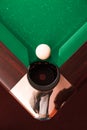 Above view on billiard ball opposite to a pocket. Royalty Free Stock Photo