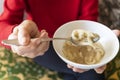 Above view of bowl with noodle soup in hand Royalty Free Stock Photo