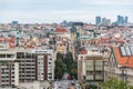 Above view of the cityscape of Prague on a sunny day. The detail view of modern and old part of town with traditional red rooftops