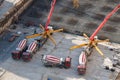 Above view of construction site with cement mixers