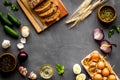 Above view of country dinner table with effs, bread, potatoes Royalty Free Stock Photo