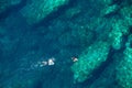 Above view of a couple snorkeling in tropical sea water Royalty Free Stock Photo