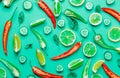 Cutted Chili pepper and basil with cytrus Royalty Free Stock Photo