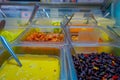 Above view of delicious and assorted salads and sauce inside of transparent boxes in a food store in Bellavista