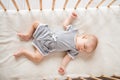 Above view full size photo of adorable cute toddler closed eyes laying bed sleep drowse house indoors