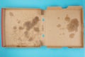 Above view of greasy empty delivery pizza box Royalty Free Stock Photo