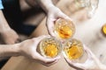 Above view group of friends toasting glasses whisky in the party Royalty Free Stock Photo