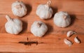 Above View Group Of Garlic Cloves Up Close Wooden Chopping Board