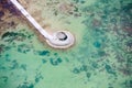 Above view of long jetty in ocean