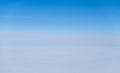 Above view many little clouds in blue sky from airplane Royalty Free Stock Photo