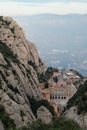 Above view of the Monastery of Montserrat, Spain, from the top of the mountain through the canyon on sunset.