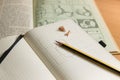 Above view of a notebook in which someone has made a sketch next to a pencil